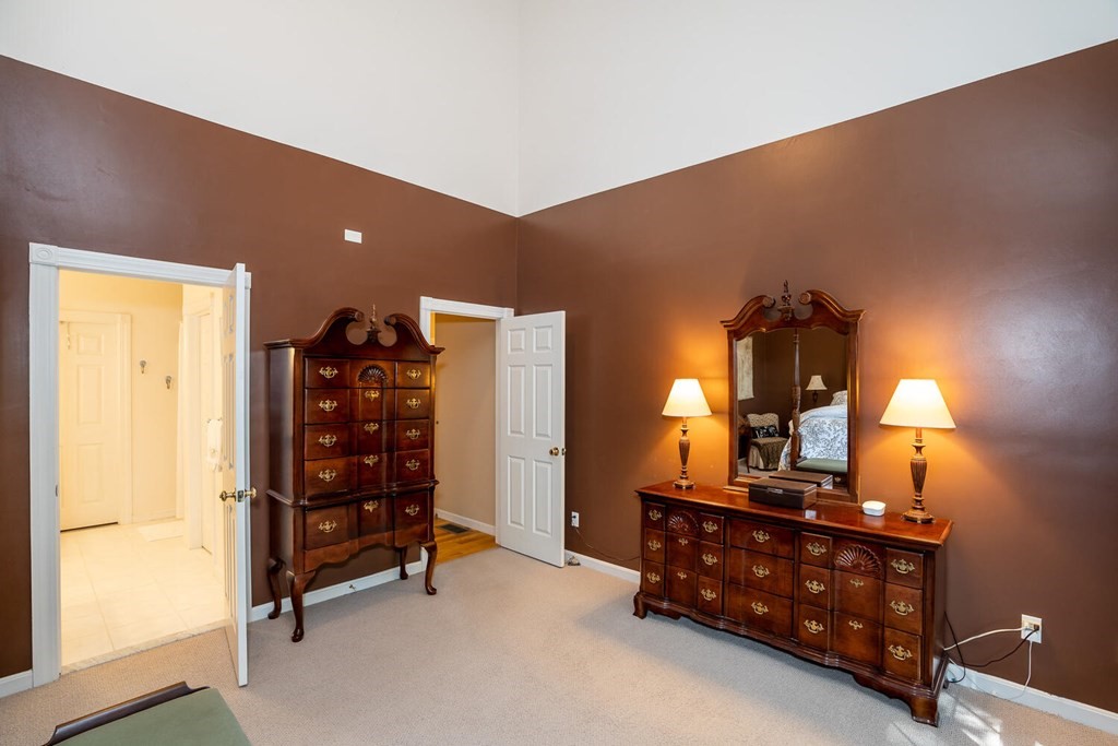 150 East Leverett Road Amherst, MA 01002 - Photo 30 of 42 a room with a dresser and a window