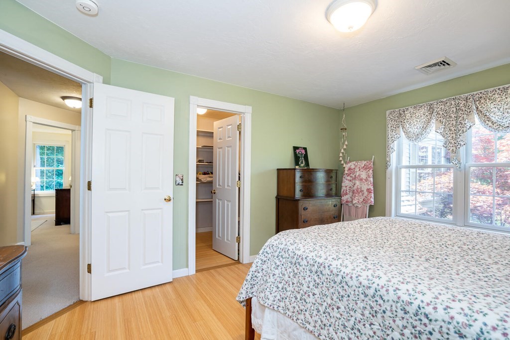 150 East Leverett Road Amherst, MA 01002 - Photo 36 of 42 a bedroom with a large bed and large window