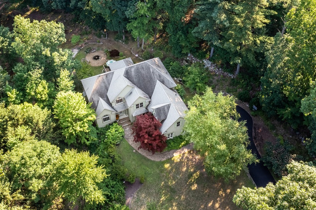150 East Leverett Road Amherst, MA 01002 - Photo 5 of 42 a aerial view of a house with a yard basket ball court and outdoor seating