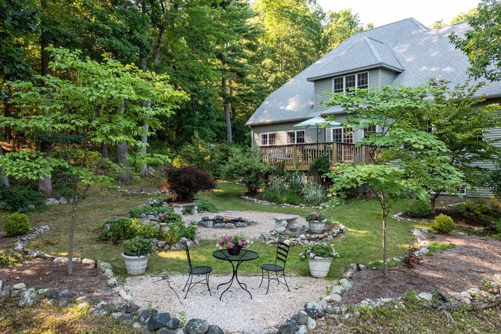 150 East Leverett Road Amherst, MA 01002 - Photo 9 of 42 a view of a garden with a patio