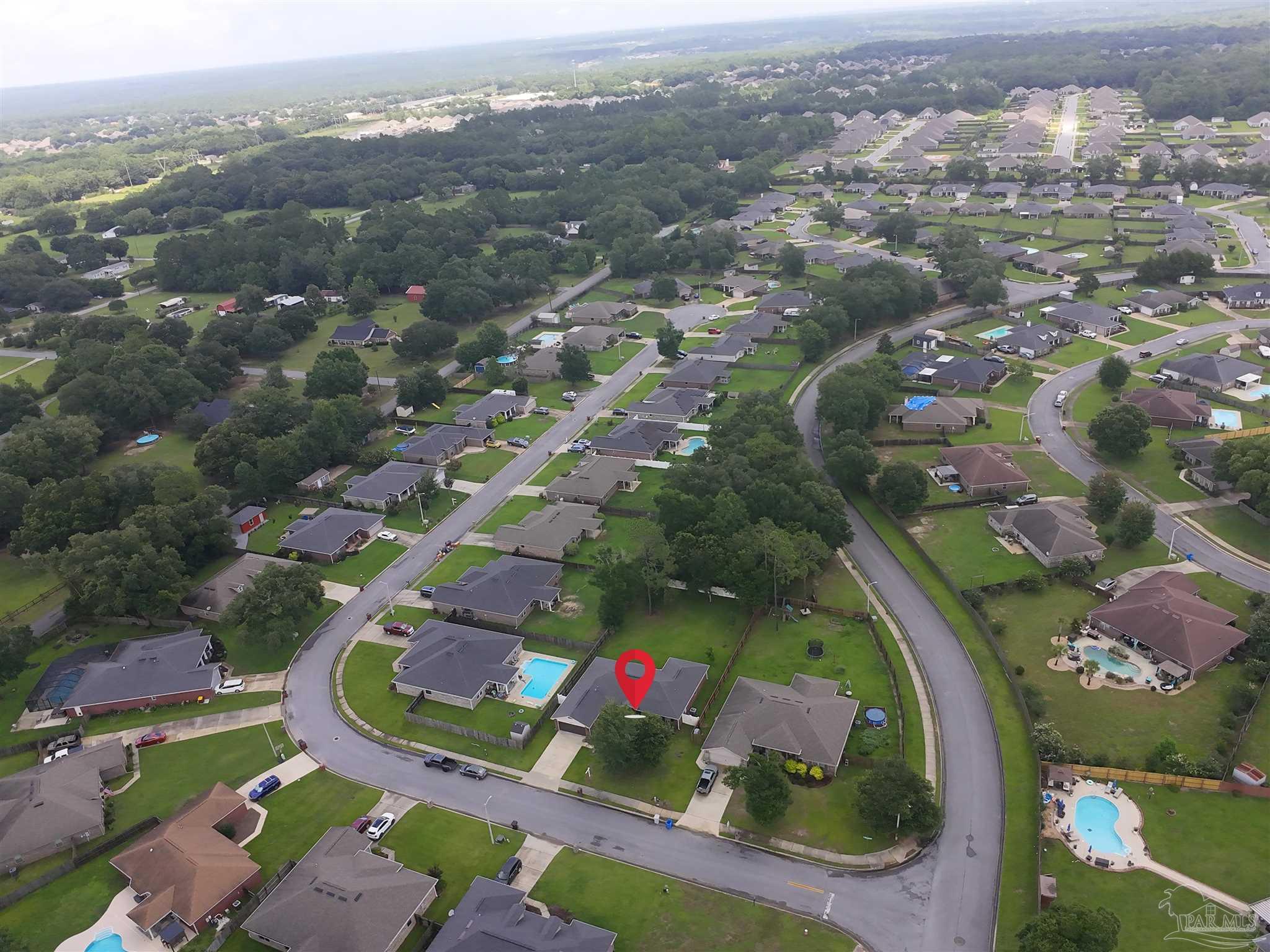 5709 Mill Stream Way Pace, FL 32571 - Photo 6 of 48 an aerial view of residential houses with outdoor space