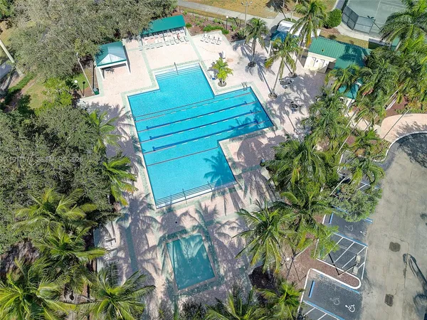 a view of a house with a tree