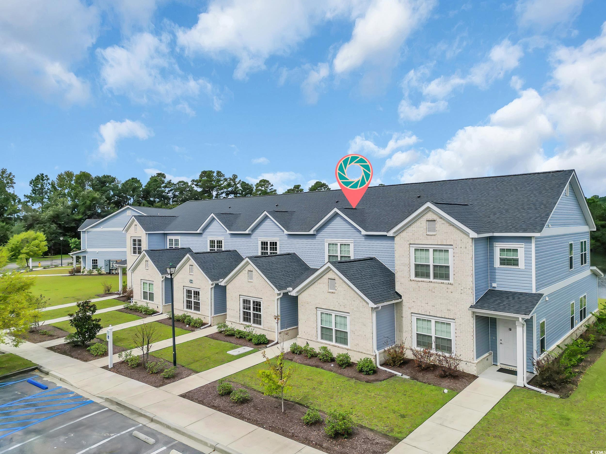 344 Kiskadee Loop Conway, SC 29526 - Photo 20 of 23 Traditional home featuring a residential view, a front yard, and brick siding
