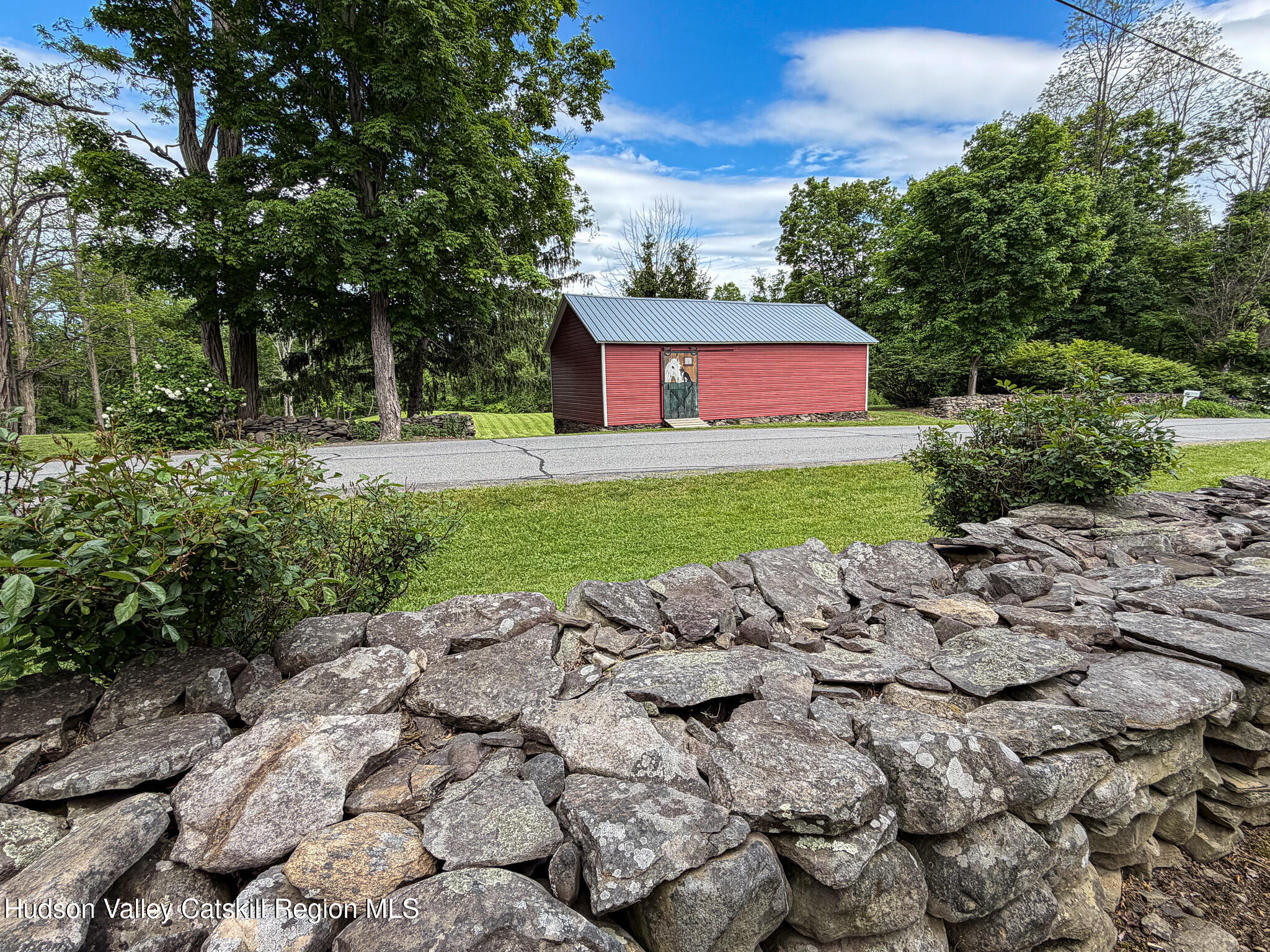 221 Camp Medusa Road Rensselaerville, NY 12120 - Photo 43 of 57 a view of a yard with plants