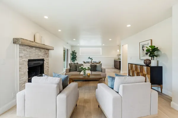 a kitchen with a table and chairs in it