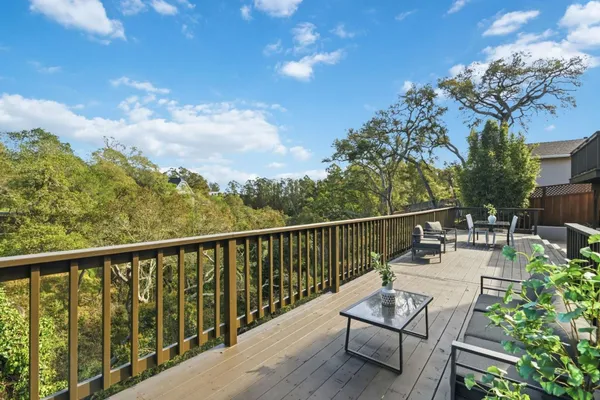 a view of balcony with furniture