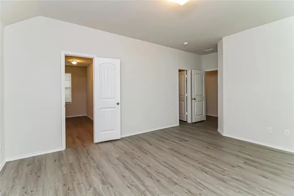 a view of a livingroom with wooden floor