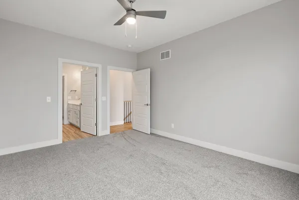 an empty room with a bathroom