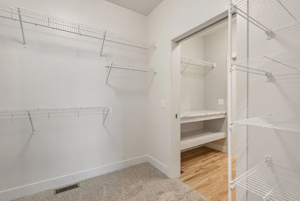 a view of an empty walk in closet