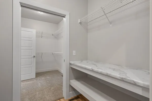 a view of room with walk in closet