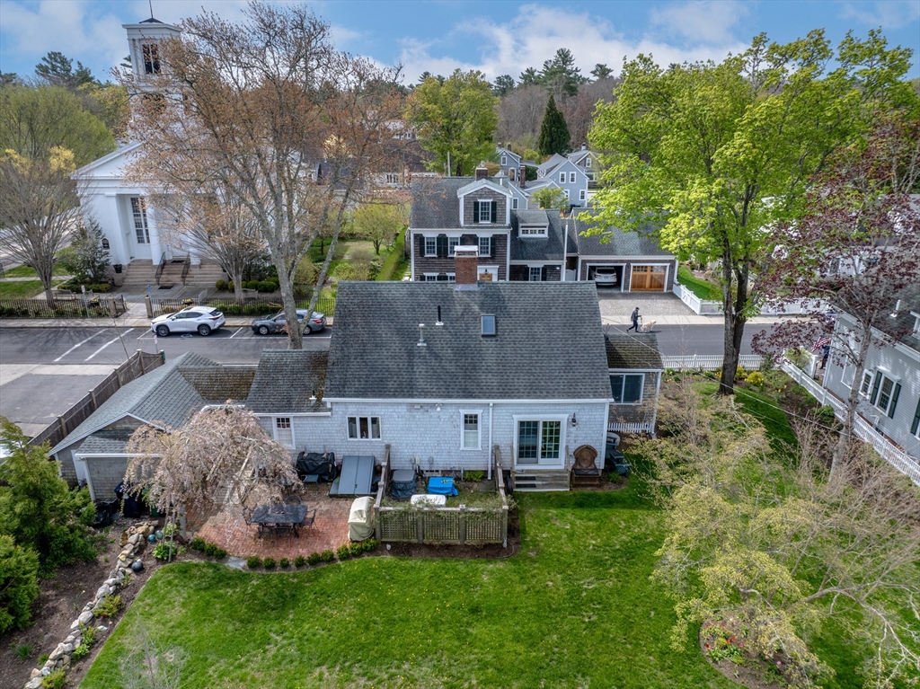31 Main Street Marion, MA 02738 - Photo 24 of 29 a aerial view of a house with a garden and sitting area