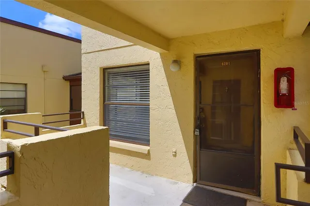 a view of street with parked cars