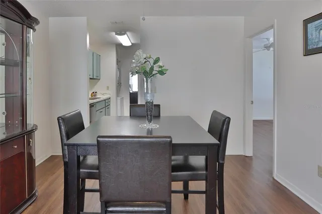 a kitchen with a sink cabinets and utility