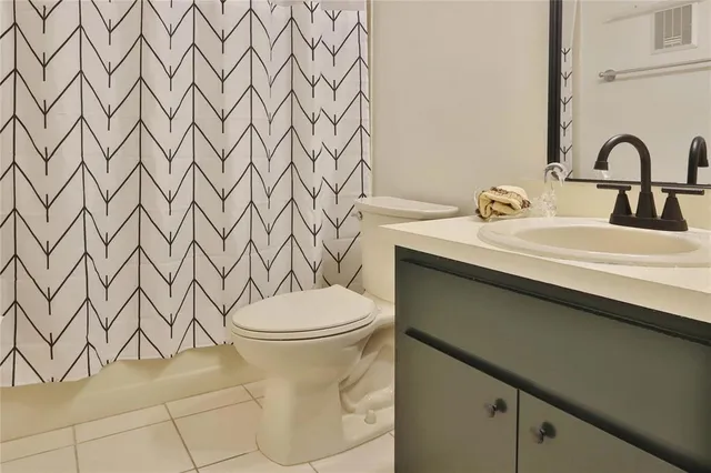 a view of a living room with a large window