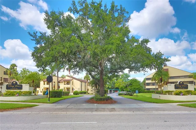a view of a parked cars in front of a house