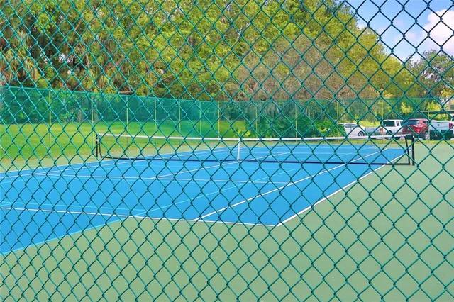 a view of street with parked cars