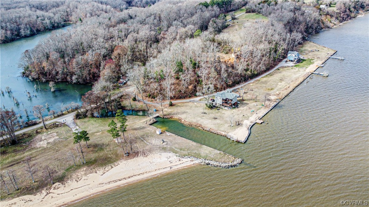 Lot 10 Sunken Meadow Rd Spring Grove Spring Grove, VA 23881 - Photo 6 of 15 a view of a garden with a pond