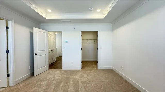 a bathroom with a shower and a sink