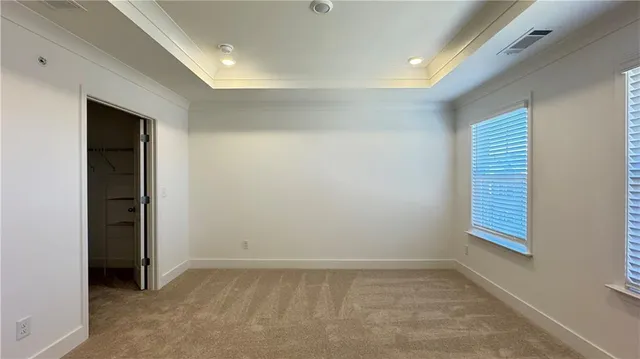a bathroom with a shower sink and mirror