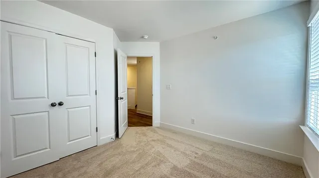 a view of a room that has a window in it