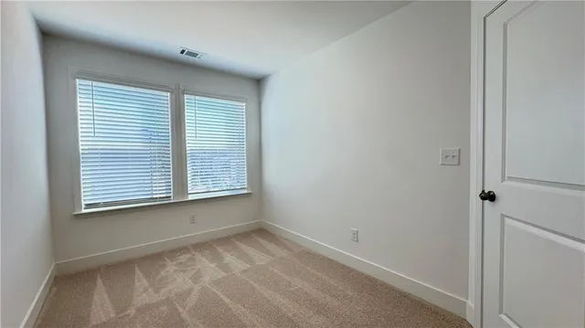 a view of balcony with a potted plant