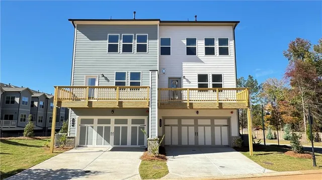 a view of lot of building with a snow in the background