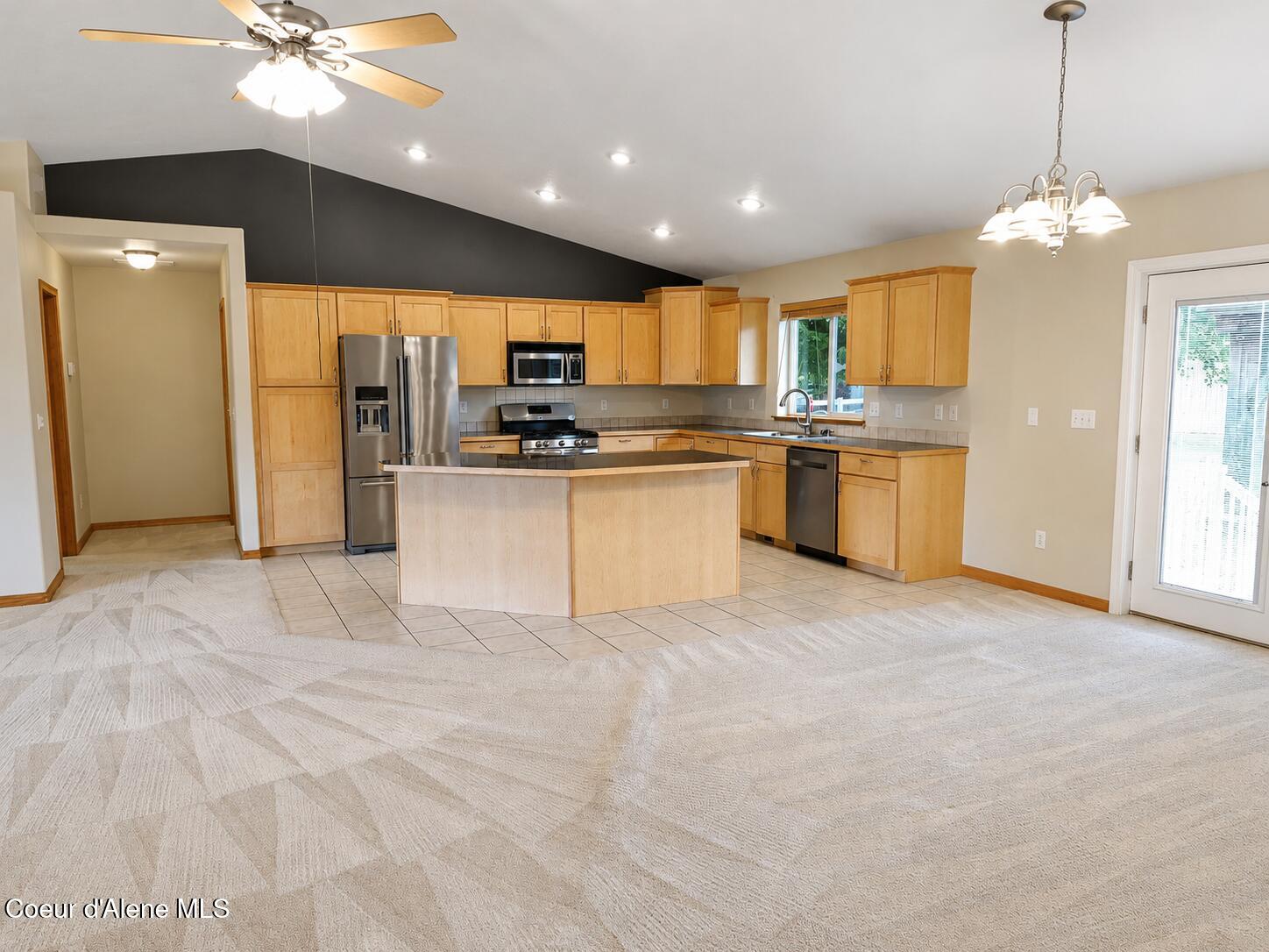 2104 West Evening Star Road Post Falls, ID 83854 - Photo 10 of 22 Kitchen and Livingroom and Dining room 3