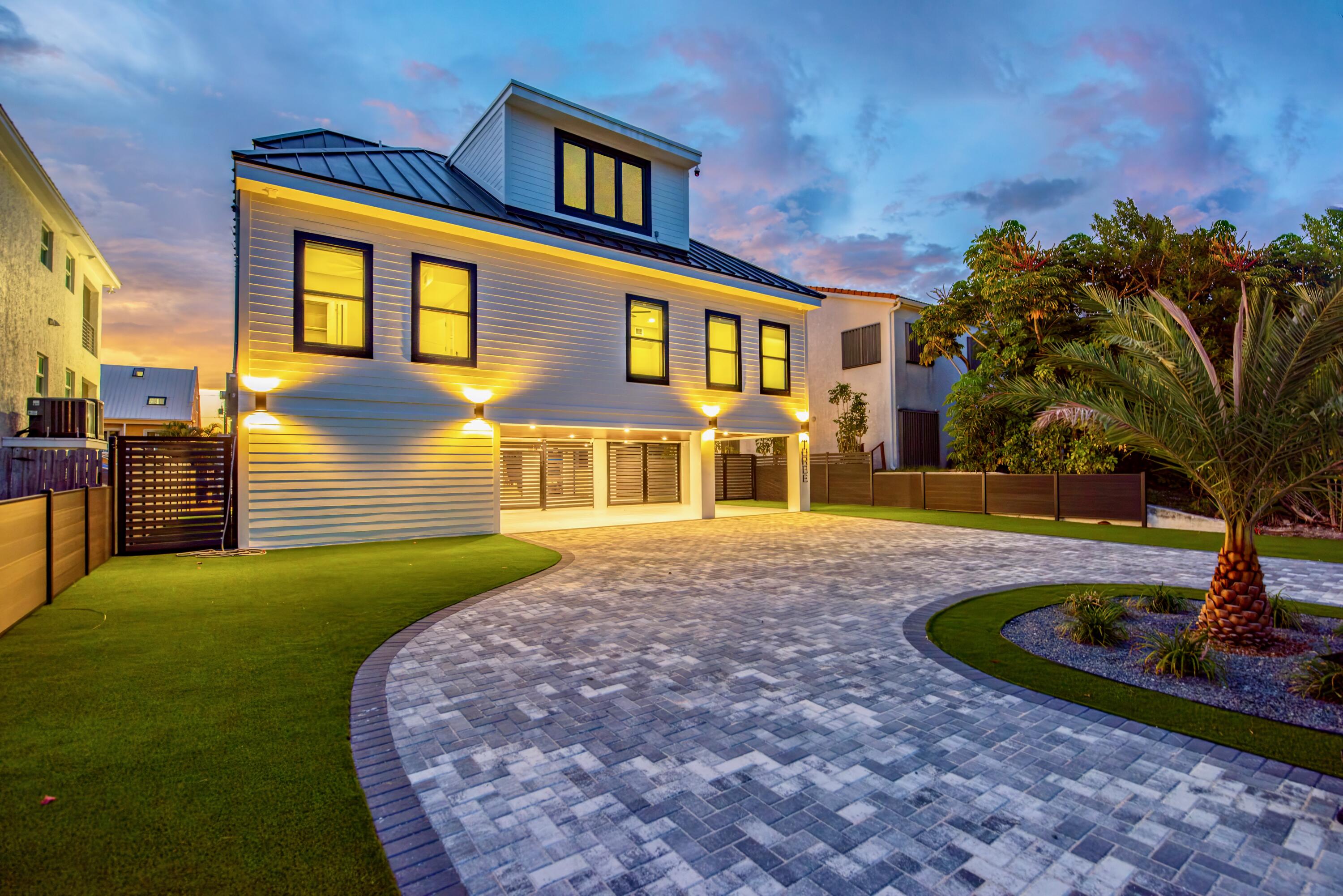 3 Evergreen Avenue Key Haven, FL 33040 - Photo 14 of 75 a front view of a house with garden