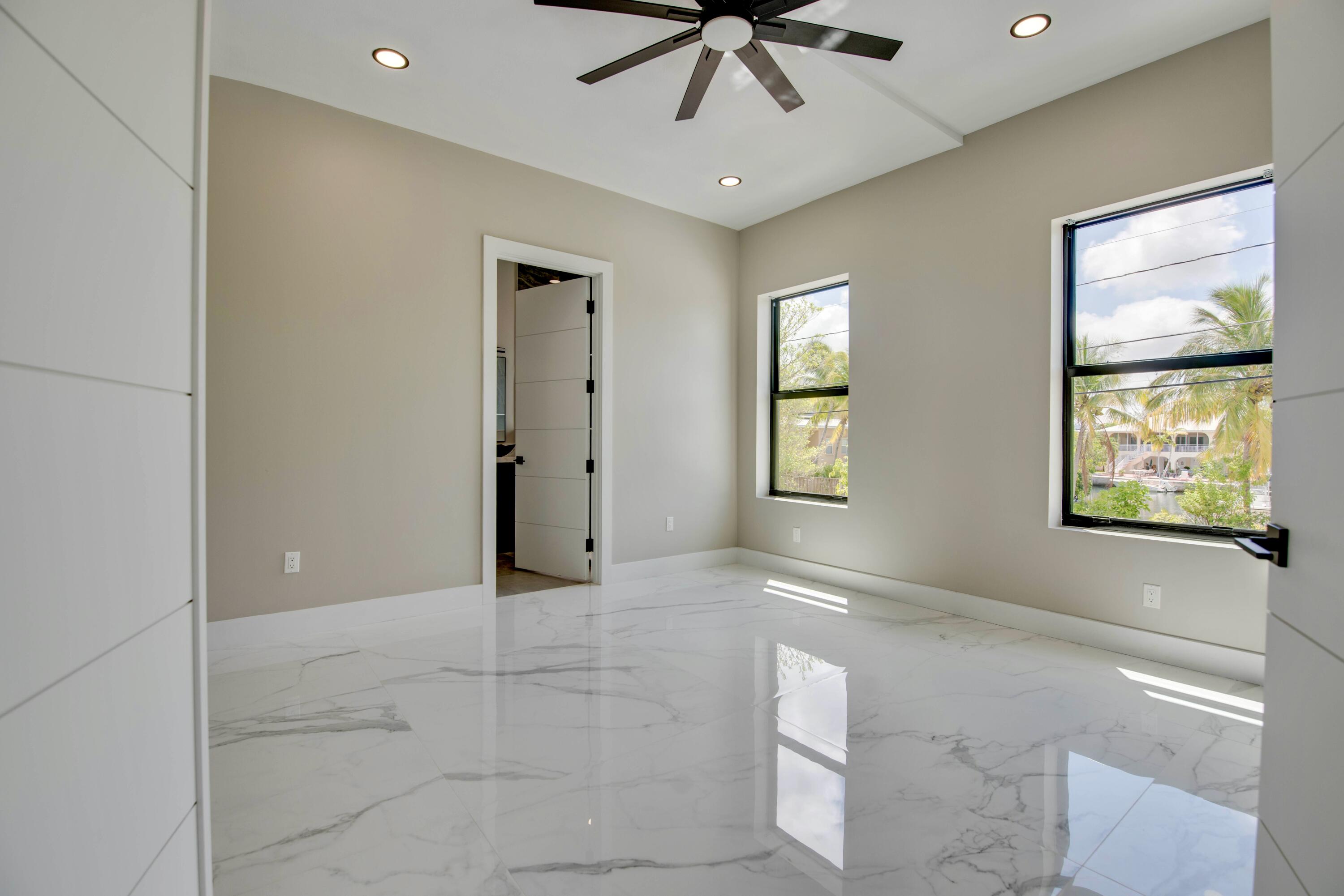 3 Evergreen Avenue Key Haven, FL 33040 - Photo 30 of 75 Primary bedroom