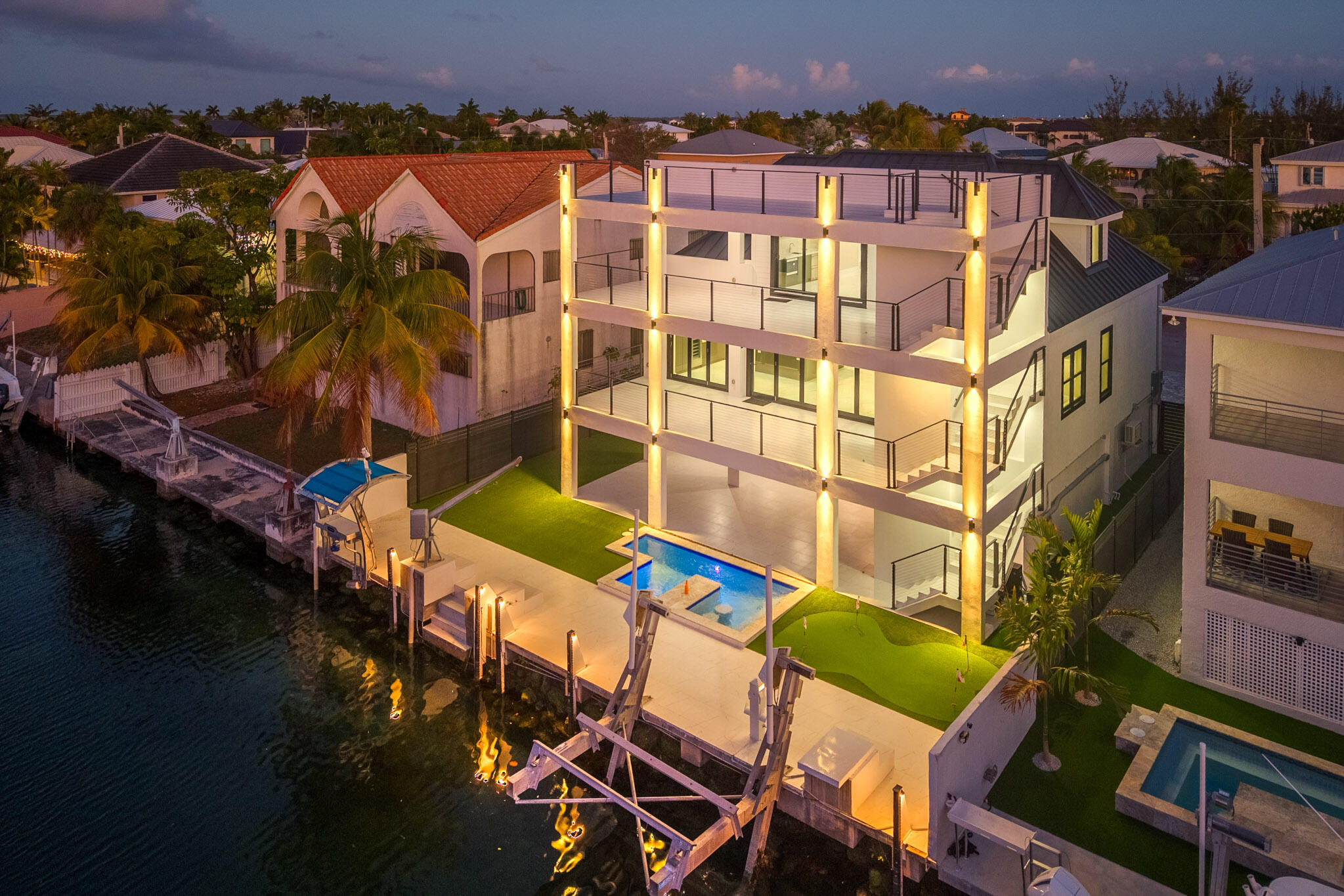 3 Evergreen Avenue Key Haven, FL 33040 - Photo 3 of 75 an aerial view of a residential apartment building with a yard