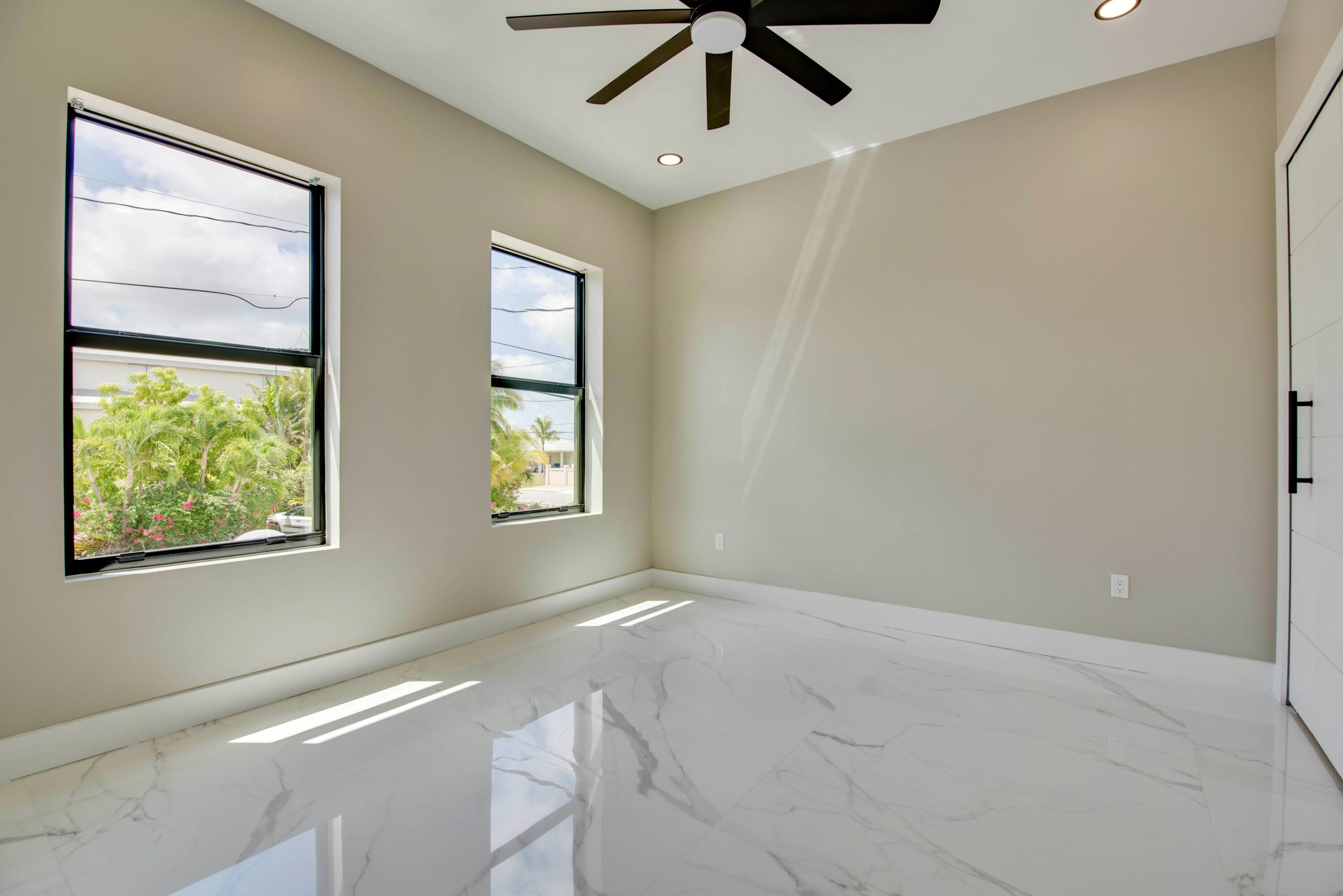 3 Evergreen Avenue Key Haven, FL 33040 - Photo 32 of 75 a view of an empty room with a window