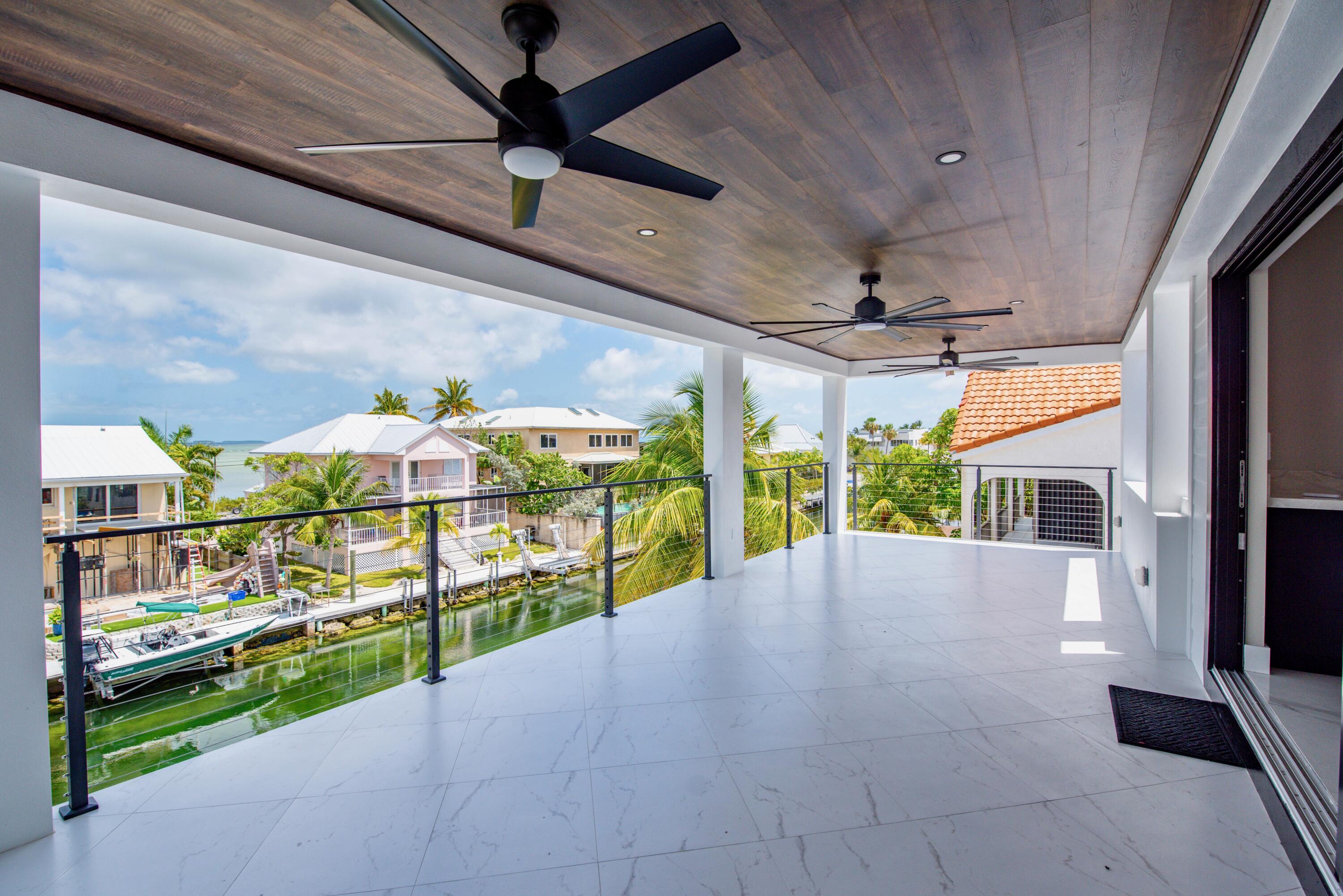 3 Evergreen Avenue Key Haven, FL 33040 - Photo 35 of 75 Main living covered entertaining