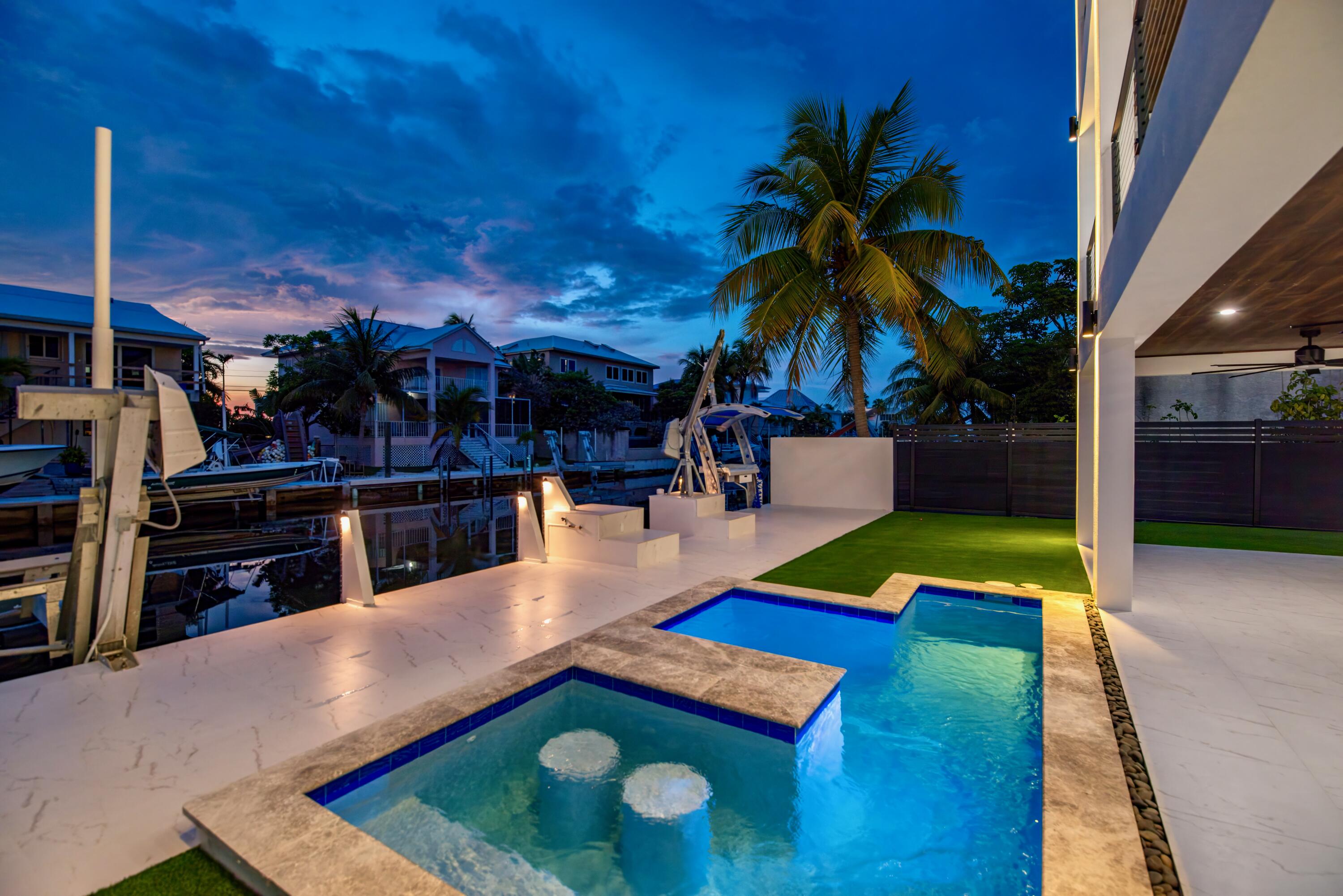 3 Evergreen Avenue Key Haven, FL 33040 - Photo 48 of 75 Pool twilight