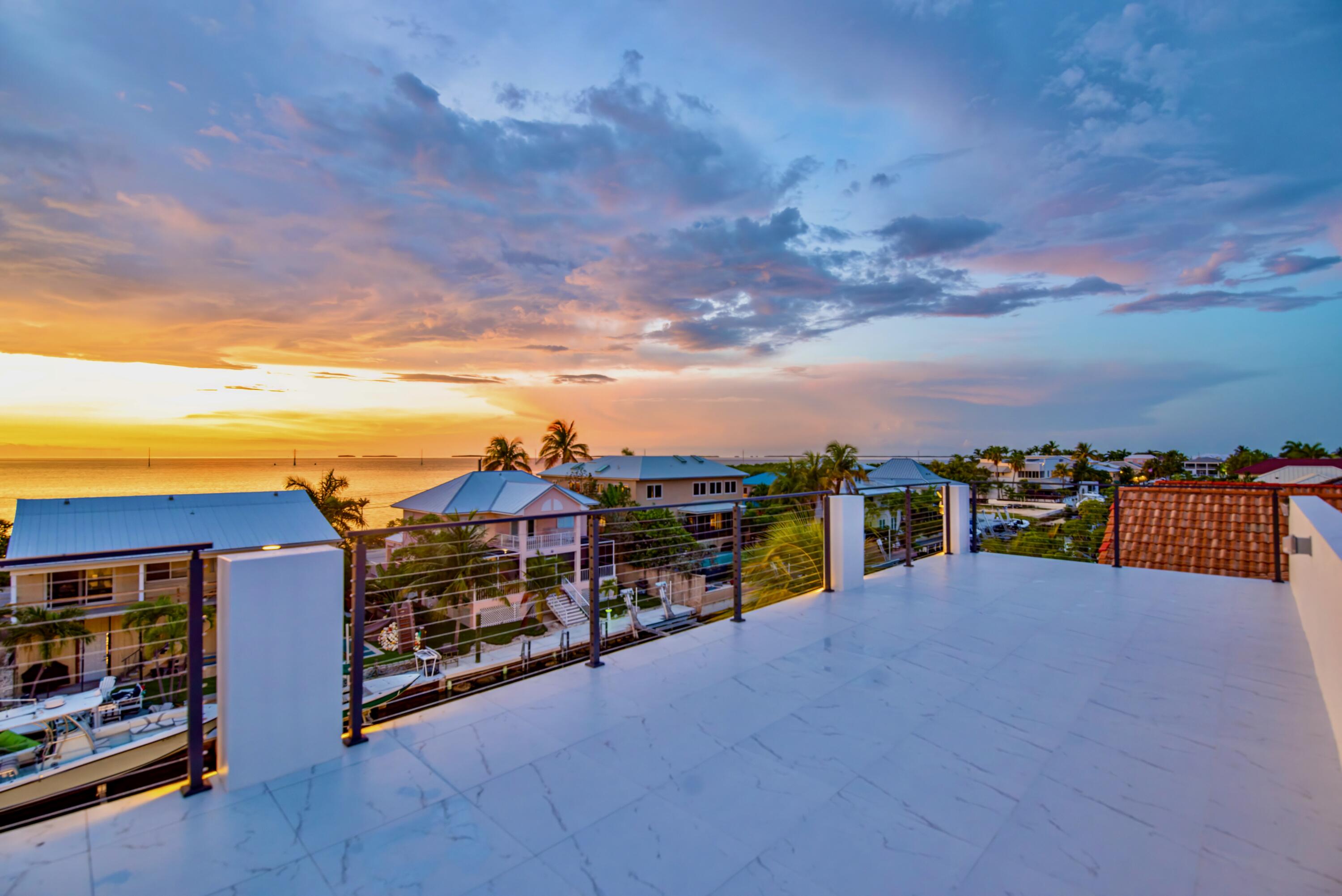 3 Evergreen Avenue Key Haven, FL 33040 - Photo 54 of 75 Rooftop deck sunset