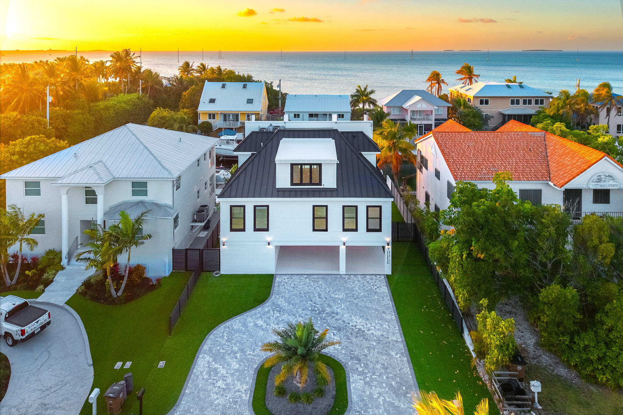 3 Evergreen Avenue Key Haven, FL 33040 - Photo 71 of 75 an aerial view of multiple houses with a yard