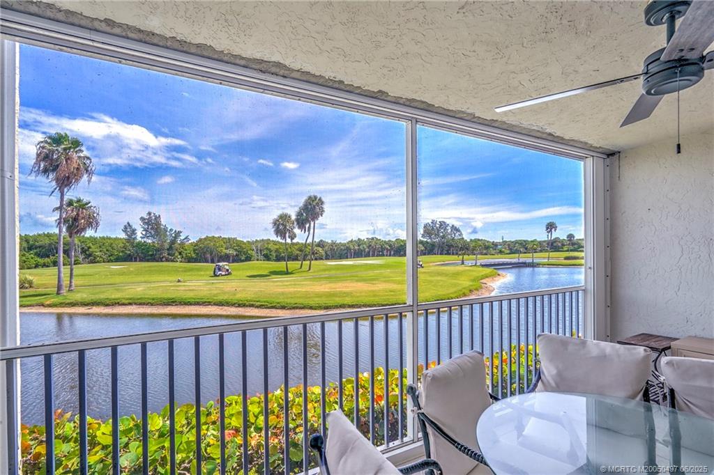 5539 Northeast Gulfstream Way Stuart, FL 34996 - Photo 21 of 26 a view of a chair and tables in the balcony