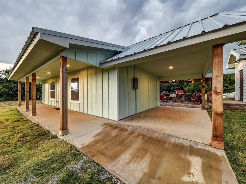 4983 Applegate Road Bowie, TX 76230 - Photo 29 of 40 a view of a porch