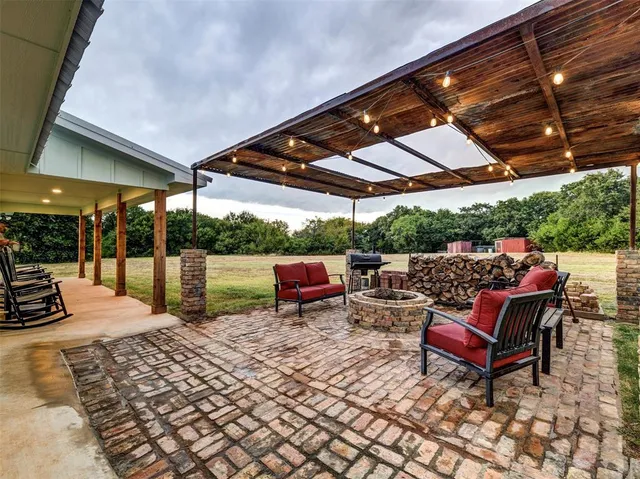 a view of a chairs and tables in the patio