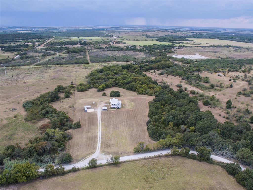 4983 Applegate Road Bowie, TX 76230 - Photo 39 of 40 an aerial view of a house with a yard