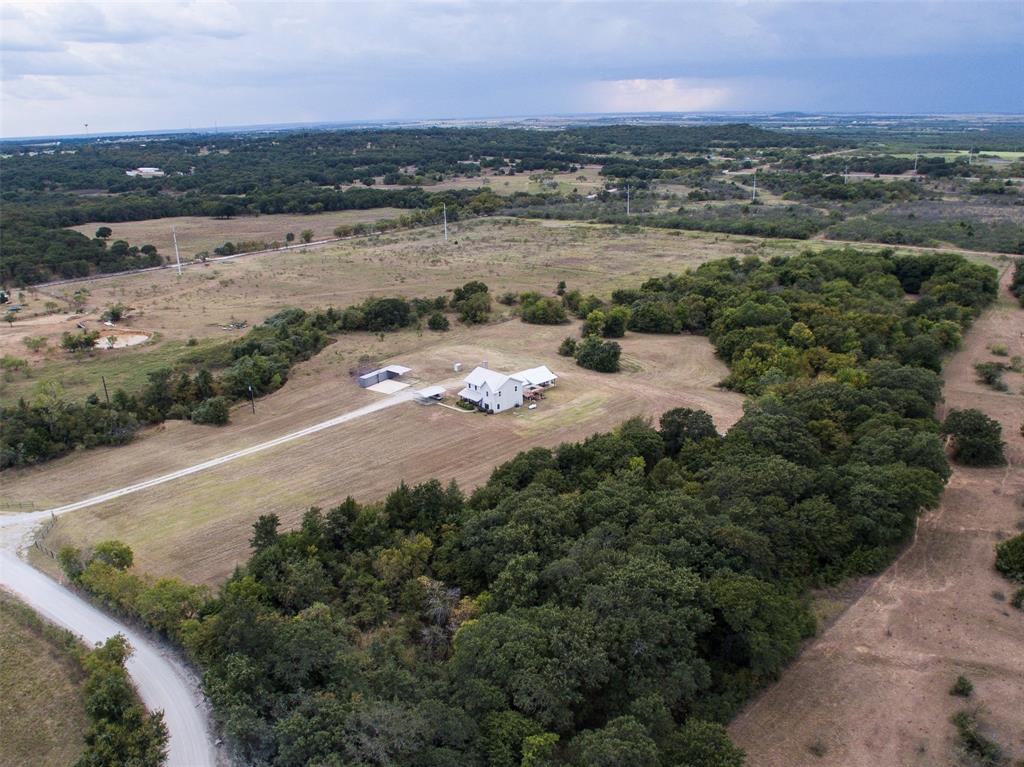4983 Applegate Road Bowie, TX 76230 - Photo 6 of 40 an aerial view of a houses with outdoor space