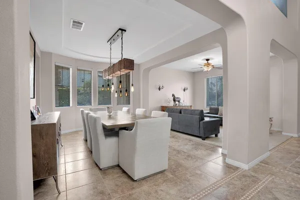 a view of a workspace with furniture