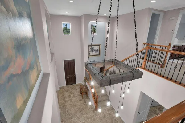 a view of a house with swimming pool and a yard