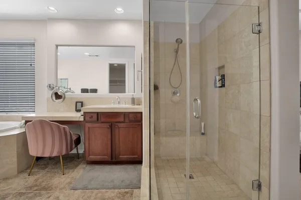 a view of a patio with couches chairs and potted plants