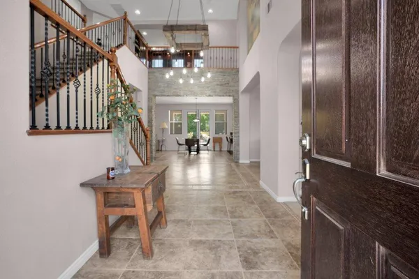 a kitchen with stainless steel appliances granite countertop sink stove and granite counter top