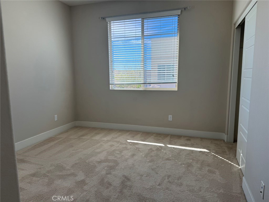 171 Interval Irvine, CA 92618 - Photo 15 of 19 an empty room with a window