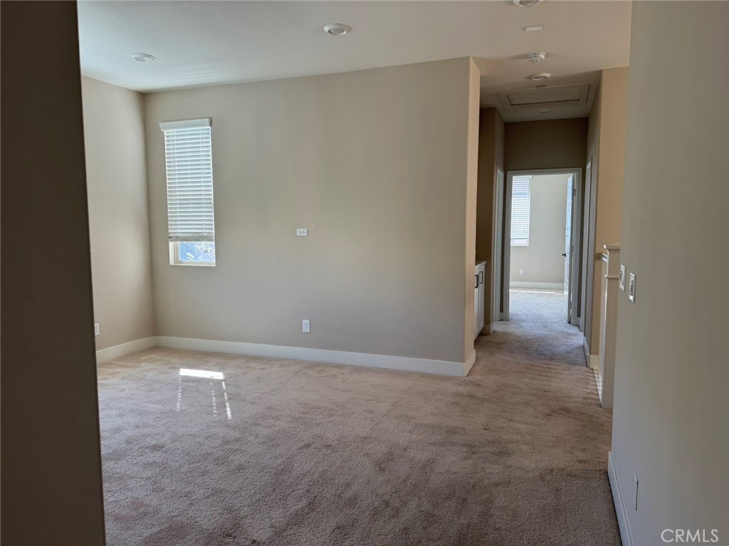 171 Interval Irvine, CA 92618 - Photo 17 of 19 a view of an empty room and window