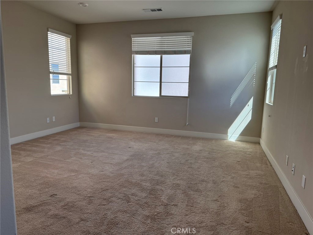 171 Interval Irvine, CA 92618 - Photo 19 of 19 an empty room with windows