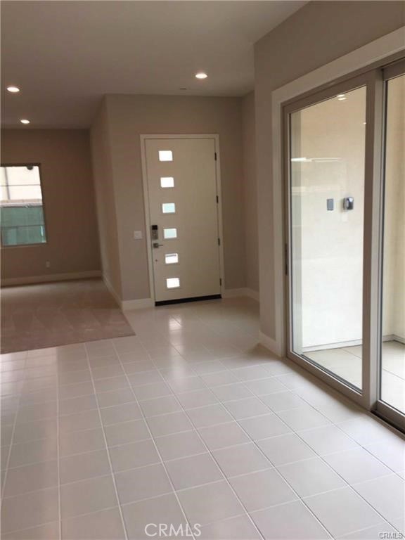 171 Interval Irvine, CA 92618 - Photo 2 of 8 a view of an empty room with a window