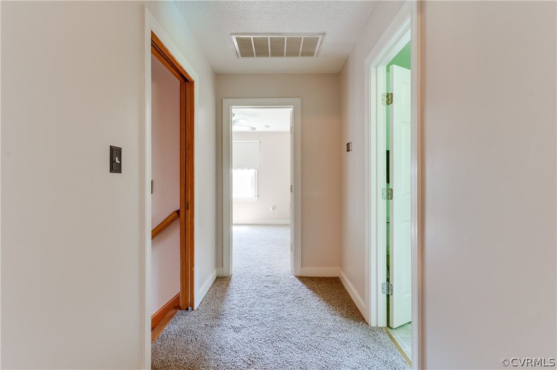 19070 Halifax Road Carson, VA 23830 - Photo 22 of 43 a view of a hallway with wooden floor