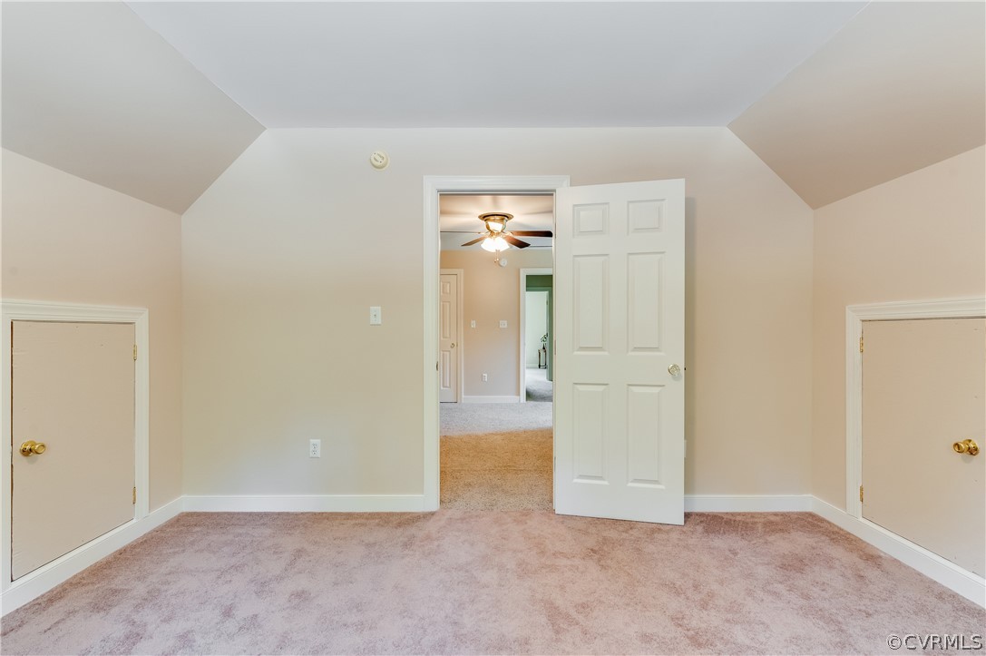 19070 Halifax Road Carson, VA 23830 - Photo 26 of 43 an empty room with mirror and closet
